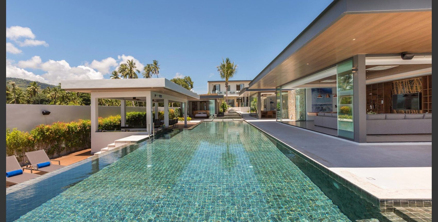 The estate and pool by day