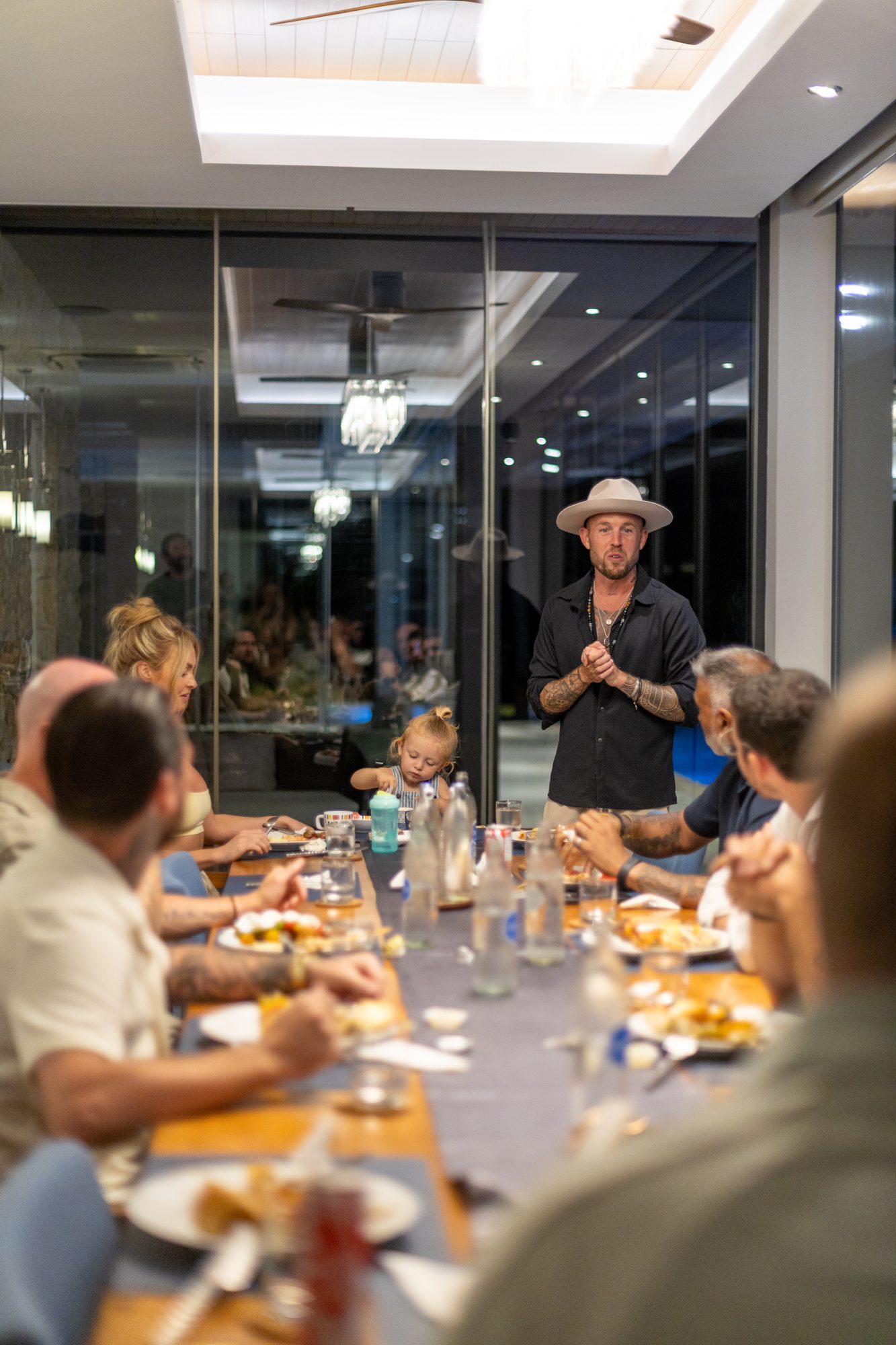 Dan holding a share at the table